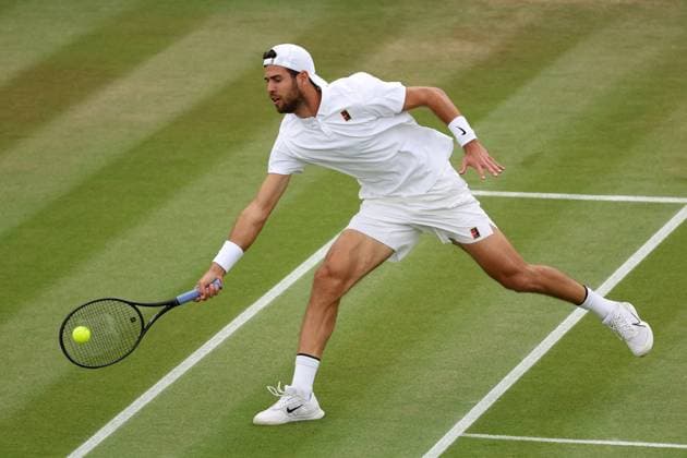 6th July 2025; All England Lawn Tennis and Croquet Club, London, England; Wimbledon Tennis Tournament, Day 7; Karen Khachanov (RUS) with a forehand shot to Kamil Majchrzak (POL)  ActionPlus12810489 JohnxPatrickxFletcher