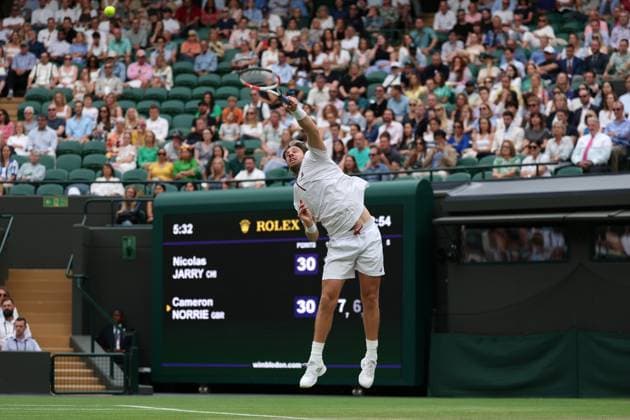 6th July 2025; All England Lawn Tennis and Croquet Club, London, England; Wimbledon Tennis Tournament, Day 7; Cameron Norrie (GBR) serves to Nicolas Jarry (CHI)  ActionPlus12810936 JohnxPatrickxFletcher