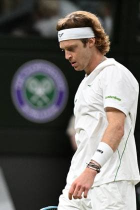 (250707) -- LONDON, July 7, 2025 -- Andrey Rublev reacts during the men s singles fourth round match between Carlos Alcaraz of Spain and Andrey Rublev of Russia at the Wimbledon Tennis Championships in London, Britain, July 6, 2025. ) (SP)BRITAIN-LONDON-TENNIS-WIMBLEDON-MEN S SINGLES ZhaoxDingzhe 