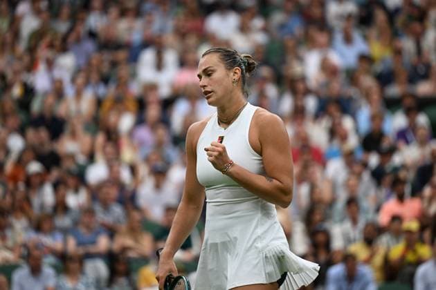 (250707) -- LONDON, July 7, 2025 -- Aryna Sabalenka reacts during the women s singles fourth round match between Aryna Sabalenka of Belarus and Elise Mertens of Belgium at the Wimbledon Tennis Championships in London, Britain, July 6, 2025. ) (SP)BRITAIN-LONDON-TENNIS-WIMBLEDON-WOMEN S SINGLES ZhaoxDingzhe 