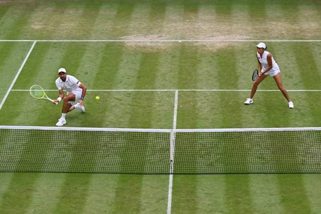 (250707) -- LONDON, July 7, 2025 -- Zhang Shuai Marcelo Arevalo (L) compete during the mixed doubles second round match between Zhang Shuai (China) Marcelo Arevalo (El Salvador) and Jiang Xinyu (China) Yuki Bhambri (India) at the Wimbledon Tennis Championships in London, Britain, July 6, 2025. ) (SP)BRITAIN-LONDON-TENNIS-WIMBLEDON-MIXED DOUBLES ZhaoxDingzhe 