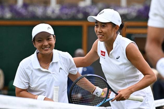(250707) -- LONDON, July 7, 2025 -- Zhang Shuai (R) greets Jiang Xinyu after the mixed doubles second round match between Zhang Shuai (China) Marcelo Arevalo (El Salvador) and Jiang Xinyu (China) Yuki Bhambri (India) at the Wimbledon Tennis Championships in London, Britain, July 6, 2025. ) (SP)BRITAIN-LONDON-TENNIS-WIMBLEDON-MIXED DOUBLES ZhaoxDingzhe 