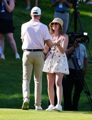 SILVIS, IL - JULY 06: PGA, Golf Herren golfer Brian Thompson is congratulated by his girlfriend Kelsi McKee after winning the John Deere Classic on July 6, 2025, at TPC Deere Run in Silvis, Illinois. (Photo by Brian Spurlock Icon Sportswire) GOLF: JUL 06 PGA John Deere Classic EDITORIAL USE ONLY Icon25070672
