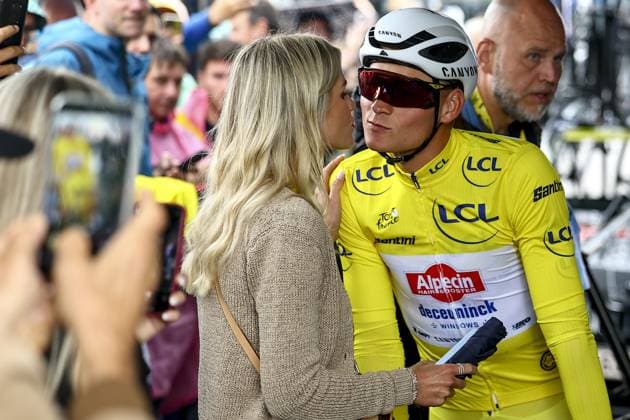 Dutch Mathieu van der Poel of Alpecin-Deceuninck and his partner Roxanne Bertels pictured at the start of the third stage of the 2025 Tour de France cycling, from Valenciennes to Dunkerque (178 km) on Monday 07 July 2025 in France. The 112th edition of the Tour de France starts on Saturday 5 July in Lille, France, and will finish in Paris, France on the 27th of July. DAVIDxPINTENS  x128594589x