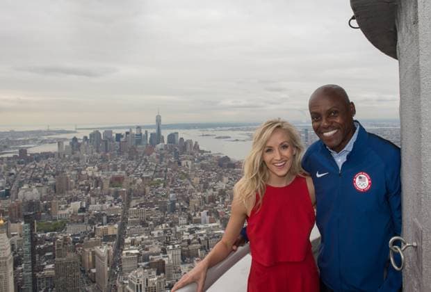 April 27, 2016 - New York, NY, USA - NASTIA LIUKIN, five-time Olympic medal-winning gymnast and CARL LEWIS, nine-time Olympic champion light the Empire State Building in celebration of the 100 day countdown to the Rio 2016 Olympic Games, Olympische Spiele, Olympia, OS Wednesday, April 27, 2016. Copyright: xBryanxSmithx