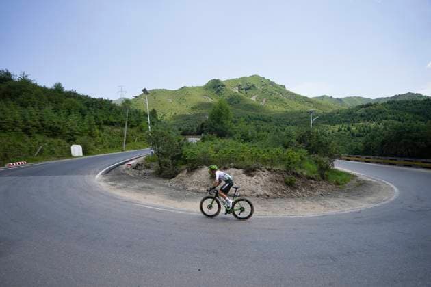 (250707) -- XINING, July 7, 2025 -- Joan Bou Company of Caja Rural-Seguros RGA competes during Stage 2 of the Tour of Magnificent Qinghai International Road cycling, Rad, Radsport, Strasse Race from Duoba to Huzhu, northwest China s Qinghai Province, July 7, 2025. ) (SP)CHINA-QINGHAI-CYCLING-TOUR OF MAGNIFICENT QINGHAI-STAGE 2 (CN) QixZhiyue 