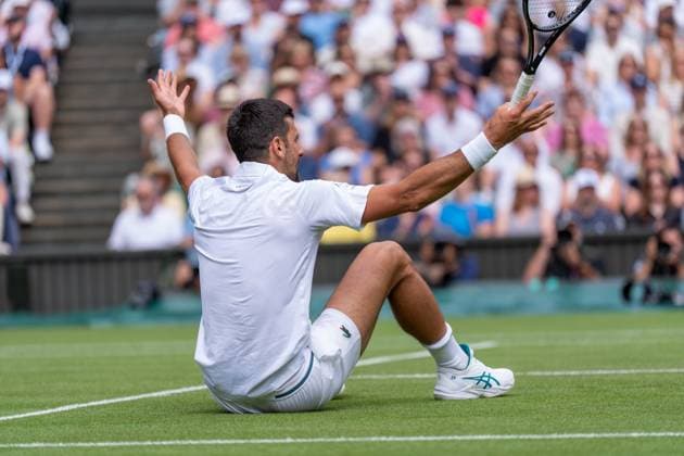 2025-07-07 Wimbledon 2025 LONDON, ENGLAND - JULY 7: Novak Djokovic of Serbia, falling during Wimbledon 2025 at All England Lawn Tennis & Croquet Club on July 7, 2025 in London, England. London All England Lawn Tennis & Croquet Club England Content not available for redistribution in The Netherlands directly or indirectly through any third parties. Copyright: xMarleenxFouchierx