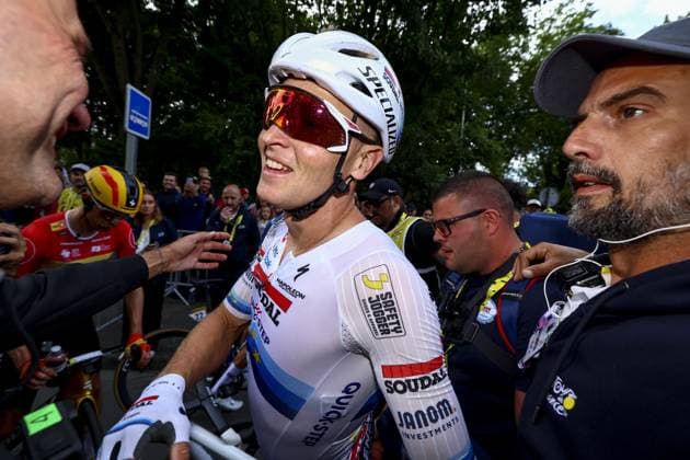 Belgian Tim Merlier of Soudal Quick-Step celebrates after winning the third stage of the 2025 Tour de France cycling, from Valenciennes to Dunkerque (178 km) on Monday 07 July 2025 in France. The 112th edition of the Tour de France starts on Saturday 5 July in Lille, France, and will finish in Paris, France on the 27th of July. DAVIDxPINTENS  x128609903x