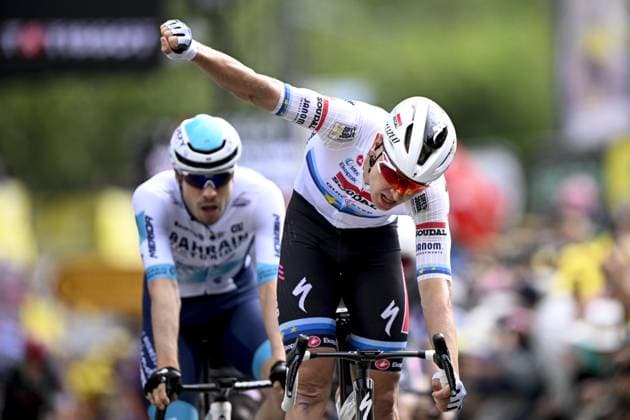 Belgian Tim Merlier of Soudal Quick-Step celebrates after winning the third stage of the 2025 Tour de France cycling, from Valenciennes to Dunkerque (178 km) on Monday 07 July 2025 in France. The 112th edition of the Tour de France starts on Saturday 5 July in Lille, France, and will finish in Paris, France on the 27th of July. DAVIDxPINTENS  x128610111x
