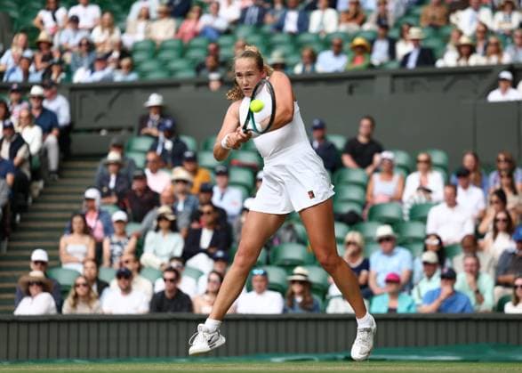7th July 2025; All England Lawn Tennis and Croquet Club, London, England; Wimbledon Tennis Tournament, Day 8; Mirra Andreeva (RUS) with a backhand shot to Emma Navarro (USA)  ActionPlus12811272 JohnxPatrickxFletcher
