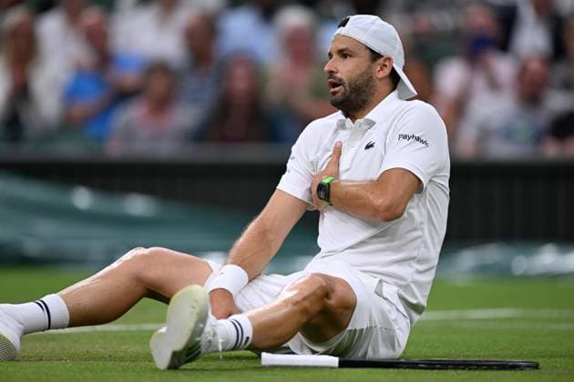 Grigor Dimitrov goes down injured when leading 2 sets to 0 during his Wimbledon 2025 Men?s Singles Round of 16 tennis match against Jannik Sinner at the All England Tennis Club in London, England (Richard Callis Sports Press Photo SPP) Copyright: xRichardxCallis SportsxPressxPhotox xSPPx spp-en-RiCaPrPh-SPP25_rica_07jul25_21914
