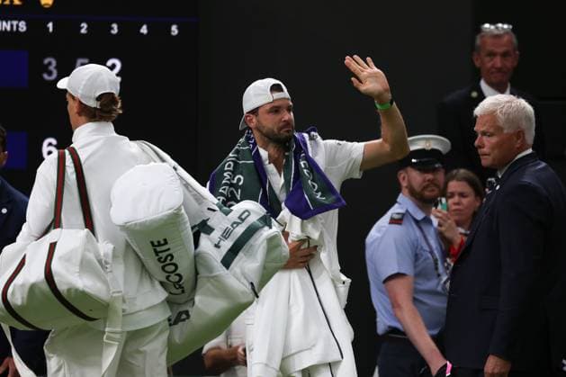 7th July 2025; All England Lawn Tennis and Croquet Club, London, England; Wimbledon Tennis Tournament, Day 8; A visibly upset Grigor Dimitrov (BUL) waving goodbye to the Centre Court crowd followed by his opponent Jannik Sinner (ITA) after damaging his pectoral muscle from serving to Jannik Sinner (ITA)  ActionPlus12811292 JohnxPatrickxFletcher
