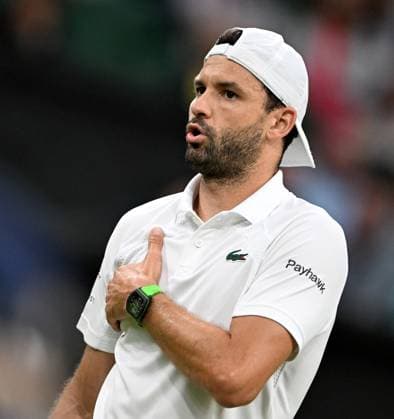 (250708) -- LONDON, July 8, 2025 -- Grigor Dimitrov reacts after getting injured during the men s singles round of 16 match between Grigor Dimitrov of Bulgaria and Jannik Sinner of Italy at the Wimbledon Tennis Championships in London, Britain, July 7, 2025. ) (SP)BRITAIN-LONDON-TENNIS-WIMBLEDON-MEN S SINGLES LixYing 