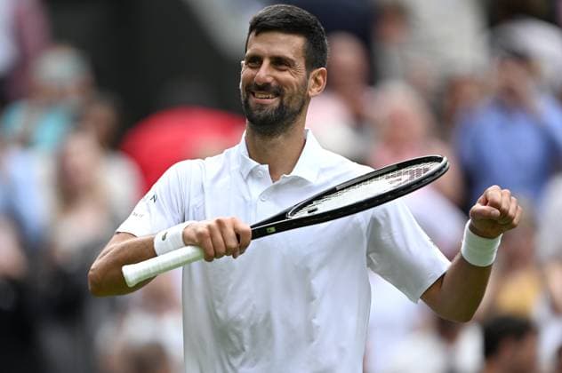 (250708) -- LONDON, July 8, 2025 -- Novak Djokovic celebrates after the men s singles round of 16 match between Novak Djokovic of Serbia and Alex De Minaur of Australia at the Wimbledon Tennis Championships in London, Britain, July 7, 2025. ) (SP)BRITAIN-LONDON-TENNIS-WIMBLEDON-MEN S SINGLES LixYing 