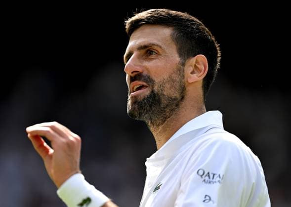 (250708) -- LONDON, July 8, 2025 -- Novak Djokovic reacts during the men s singles round of 16 match between Novak Djokovic of Serbia and Alex De Minaur of Australia at the Wimbledon Tennis Championships in London, Britain, July 7, 2025. ) (SP)BRITAIN-LONDON-TENNIS-WIMBLEDON-MEN S SINGLES LixYing 