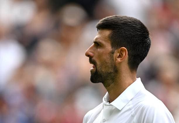 (250708) -- LONDON, July 8, 2025 -- Novak Djokovic reacts during the men s singles round of 16 match between Novak Djokovic of Serbia and Alex De Minaur of Australia at the Wimbledon Tennis Championships in London, Britain, July 7, 2025. ) (SP)BRITAIN-LONDON-TENNIS-WIMBLEDON-MEN S SINGLES LixYing 