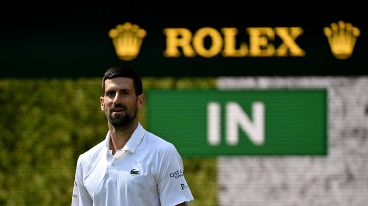 (250708) -- LONDON, July 8, 2025 -- Novak Djokovic reacts during the men s singles round of 16 match between Novak Djokovic of Serbia and Alex De Minaur of Australia at the Wimbledon Tennis Championships in London, Britain, July 7, 2025. ) (SP)BRITAIN-LONDON-TENNIS-WIMBLEDON-MEN S SINGLES LixYing 