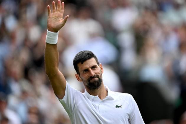 (250708) -- LONDON, July 8, 2025 -- Novak Djokovic celebrates after the men s singles round of 16 match between Novak Djokovic of Serbia and Alex De Minaur of Australia at the Wimbledon Tennis Championships in London, Britain, July 7, 2025. ) (SP)BRITAIN-LONDON-TENNIS-WIMBLEDON-MEN S SINGLES LixYing 