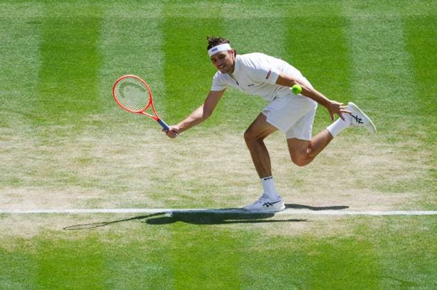 Wimbledon 2025 Taylor Fritz v Karen Khachanov Wimbledon Championships 2025 Day 9, 08 07 25 Gentlemens’ Singles - Quarter Final Court No.1 Taylor Fritz v Karen Khachanov Taylor Fritz in action  Copyright: xMarcxAsplandx NINTCHDBPICT001008448446