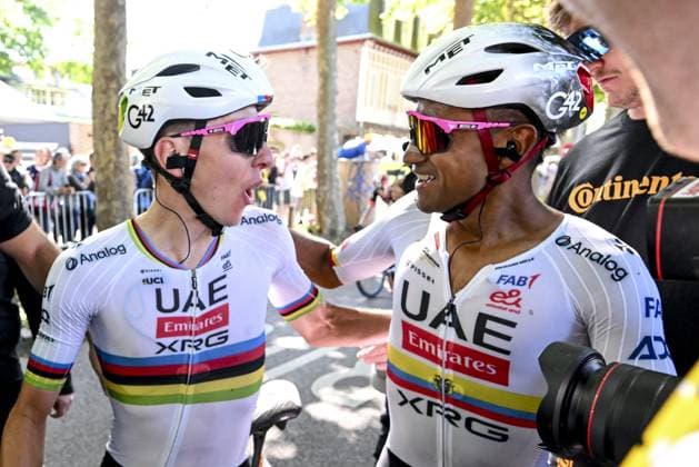 Portuguese Joao Almeida of UAE Team Emirates and Slovenian Tadej Pogacar of UAE Team Emirates celebrate after Pogacar won the fourth stage of the 2025 Tour de France cycling, Amien Metropole - Rouen (173 km), on Tuesday 08 July 2025 in France. The 112th edition of the Tour de France starts on Saturday 5 July in Lille, France, and will finish in Paris, France on the 27th of July. POOLxSZYMONxGRUCHALSKI  x128709813x