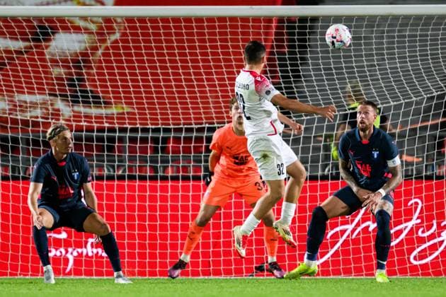 250708 Anes Rusevic of FC Iberia scores the 1-3 goal behind goalkeeper Melker Ellborg of Malmö FF during the UEFA Champions League qualifier football match between FC Iberia 1999 and Malmö FF on July 8, 2025 in Tbilisi. Photo: Petter Arvidson BILDBYRAN kod PA PA1053 fotboll football soccer fotball uefa champions league champions league fc iberia malmö ff bbeng kval bbauto Copyright: PETTERxARVIDSON BB250708PA144