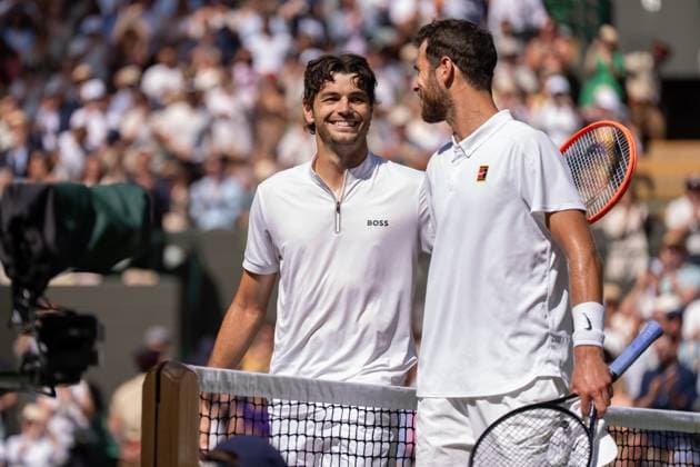 2025-07-08 The Championships Wimbledon 2025 LONDON, UNITED KINGDOM - JULY 8: Taylor Fritz of United States of America interacts with Karen Khachanov of Russia during Day Nine of The Championships Wimbledon 2025 at All England Lawn Tennis and Croquet Club on July 8, 2025 in London, United Kingdom. (Photo by Marleen Fouchier BSR Agency) London United Kingdom Content not available for redistribution in The Netherlands directly or indirectly through any third parties. Copyright: xBSRxAgencyx