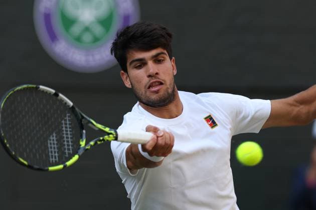 July 8, 2025, London, Celestynow, United Kingdom: CARLOS ALCARAZ of Spain during the match against C. Norrie of United Kingdom in the quarterfinal of Championships 2025 at Wimbledon AELTC in London. Alcaraz won 6:2, 6:3, 6:3 London United Kingdom - ZUMAc278 20250708_zsp_c278_053 Copyright: xMarcinxCholewinskix