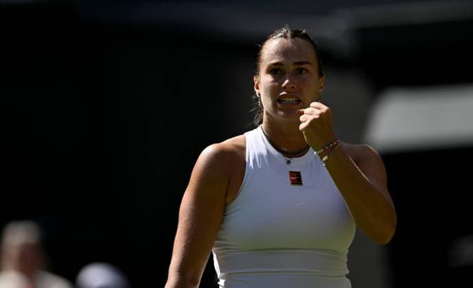 (250709) -- LONDON, July 9, 2025 -- Aryna Sabalenka celebrates scoring during the women s singles quarterfinal match between Aryna Sabalenka of Belarus and Laura Siegemund of Germany at the Wimbledon Tennis Championships in London, Britain, July 8, 2025. ) (SP)BRITAIN-LONDON-TENNIS-WIMBLEDON-WOMEN S SINGLES LixYing 