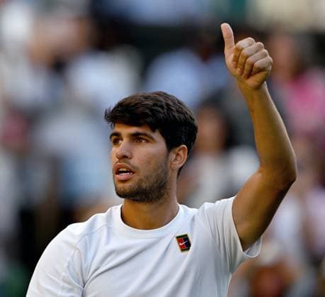 (250709) -- LONDON, July 9, 2025 -- Carlos Alcaraz celebrates after the men s singles quarterfinal match between Carlos Alcaraz of Spain and Cameron Norrie of Britain at the Wimbledon Tennis Championships in London, Britain, July 8, 2025. ) (SP)BRITAIN-LONDON-TENNIS-WIMBLEDON-MEN S SINGLES LixYing 