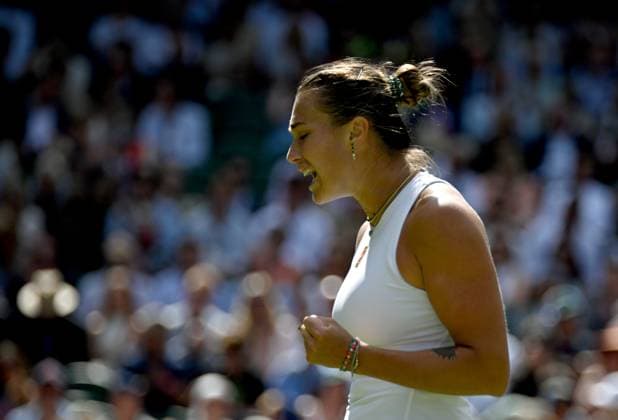 (250709) -- LONDON, July 9, 2025 -- Aryna Sabalenka celebrates scoring during the women s singles quarterfinal match between Aryna Sabalenka of Belarus and Laura Siegemund of Germany at the Wimbledon Tennis Championships in London, Britain, July 8, 2025. ) (SP)BRITAIN-LONDON-TENNIS-WIMBLEDON-WOMEN S SINGLES LixYing 