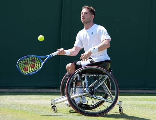 Tennis - 2025 Wimbledon Championships - Men™s Doubles Wheelchair - Quarter Final - Alfie Hewett and Gordon Reid (GBR) v Takuya Miki (Japan) and Casey Ratzlaff (USA) All England Lawn Tennis & Croquet Club - Wednesday 9th July 2025 Alfie Hewett (GBR) 