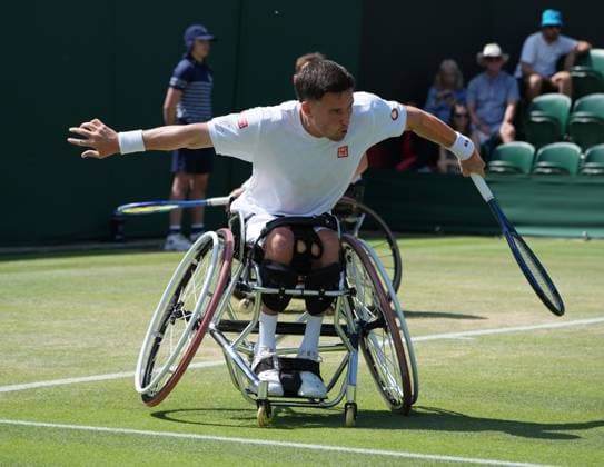 Tennis - 2025 Wimbledon Championships - Men™s Doubles Wheelchair - Quarter Final - Alfie Hewett and Gordon Reid (GBR) v Takuya Miki (Japan) and Casey Ratzlaff (USA) All England Lawn Tennis & Croquet Club - Wednesday 9th July 2025 Gordon Reid (GBR) 