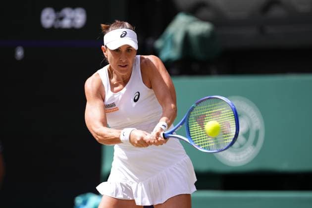 LONDON, ENGLAND - JULY 09: Belinda Bencic of Switzerland in action against Mirra Andreeva during the Ladies Singles quarter-final match on day ten of The Championships Wimbledon 2025 at All England Lawn Tennis and Croquet Club on July 09, 2025 in London, England.  Copyright: xx