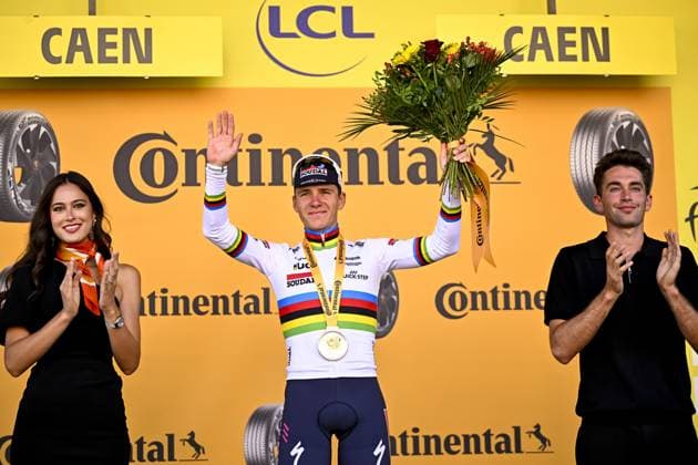 Belgian Remco Evenepoel of Soudal Quick-Step celebrates after winning stage five of the 2025 Tour de France cycling, a 33km time trial in Caen, France on Wednesday 09 July 2025. The 112th edition of the Tour de France starts on Saturday 5 July in Lille, France, and will finish in Paris, France on the 27th of July. JASPERxJACOBS  x128773172x