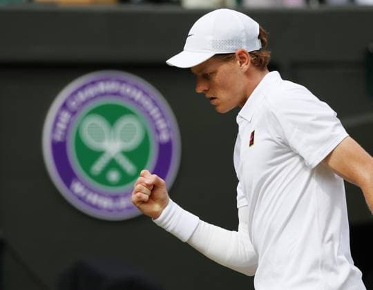 Italian Jannik Sinner reacts in his Quarter-Final match against American Ben Shelton on day ten of the 2025 Wimbledon Championships in London on Wednesday, July 09, 2025.  LON2025070969 HUGOxPHILPOTT