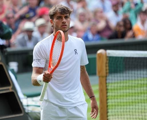 Tennis - 2025 Wimbledon Championships - Men™s singles- Quarter Final - Flavio Cobolli v Novak Djokovic All England Lawn Tennis & Croquet Club - Wednesday 9th July 2025 Flavio Cobolli of Italy looks to his players box after winning the first set 