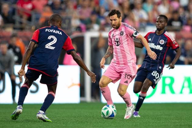 July 9, 2025; Foxborough, Massachusetts, USA; Inter Miami CF forward Lionel Messi (10) dances past New England Revolution midfielder Alhassan Yusuf (80) and New England Revolution defender Mamadou Fofana (2) in a Major League Soccer game between the New England Revolution and Inter Miami CF at Gillette Stadium. (c) CSM - ZUMAc04_ 20250709_zma_c04_186 Copyright: xBurtxGranofskyx