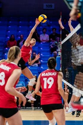 (250710) -- ARLINGTON, July 10, 2025 -- Andrea Mitrovic (top) of Canada spikes the ball during the Pool 8 match between Germany and Canada at the Women s Volleyball Nations League (VNL) 2025 in Arlington, the United States, July 9, 2025. (Photo by Xinhua) (SP)U.S.-ARLINGTON-VOLLEYBALL-NATIONS LEAGUE-WOMEN-GERMANY VS CANADA ChenxChen 