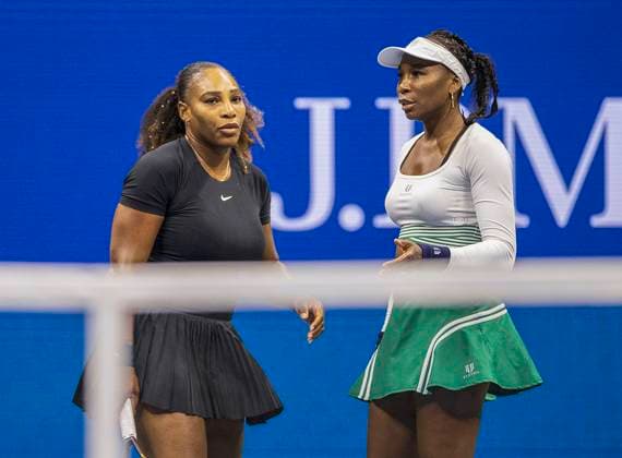 September 1, 2022, FLUSHING MEADOWS, NEW YORK, USA: Serena Williams and Venus Williams chat during their match with Lucie Hradecka and Linda Noskova on Day 4 of the 2022 US Open at USTA Billie Jean King National Tennis Center on Thursday September 1, 2022 in the Flushing neighborhood of the Queens borough of New York City. JAVIER ROJAS PI Copyright: xJAVIERxROJASx