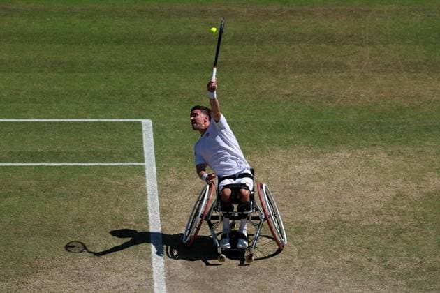 9th July 2025; All England Lawn Tennis and Croquet Club, London, England; Wimbledon Tennis Tournament, Day 10; Gordon Reid (GBR) serves to Gustavo Fernandez (ARG) in their mens wheelchair singles quarter-final  ActionPlus12812013 JohnxPatrickxFletcher