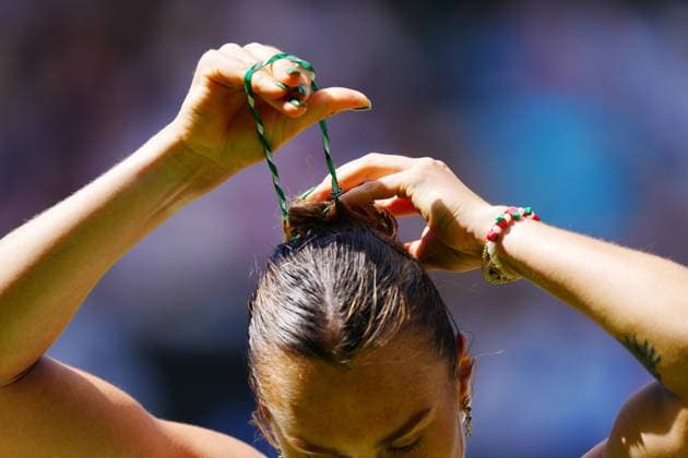 Aryna Sabalenka adjusts her hair during her semi final match Wimbledon Tennis Championships, Day 11, The All England Lawn Tennis and Croquet Club, London, UK - 10 Jul 2025London The All England Lawn Tennis and United Kingdom  Copyright: xJavierxGarcia Shutterstockx 15390589cr