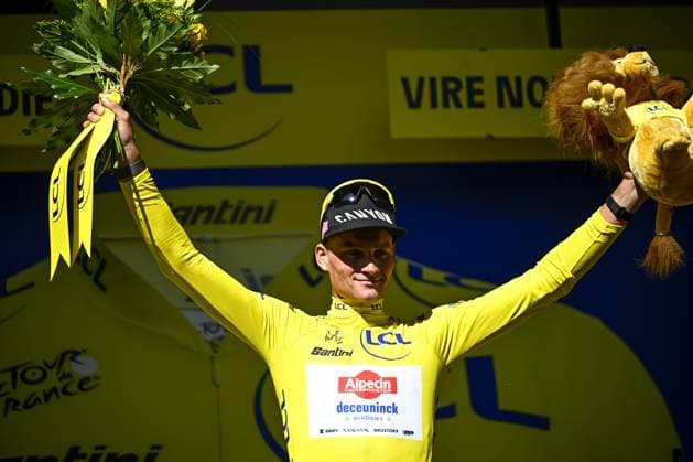 Dutch Mathieu van der Poel of Alpecin-Deceuninck celebrates on the podium in the yellow jersey of leader in the overall ranking after stage six of the 2025 Tour de France cycling, from Bayeux to Vire Normandie (201 km), on Thursday 10 July 2025 in France. The 112th edition of the Tour de France starts on Saturday 5 July in Lille, France, and will finish in Paris, France on the 27th of July. JASPERxJACOBS  x128853167x