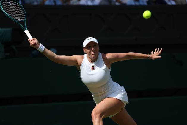 American Amanda Anisimova plays a forehand in her Semi-Final match against Belarusian Aryna Sabalenka on day ten of the 2025 Wimbledon Championships in London on Thursday, July 10, 2025. Anisimova won the match 6-4,4-6,6-4.  LON2025071032 HUGOxPHILPOTT