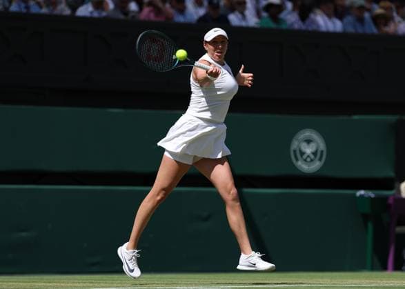 10th July 2025; All England Lawn Tennis and Croquet Club, London, England; Wimbledon Tennis Tournament, Day 11; Amanda Anisimova (USA) with a forehand shot to Aryna Sabalenka (BLR) during their womens singles semi-final match  ActionPlus12812159 JohnxPatrickxFletcher