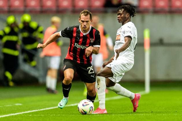 250710 Martin Mikovic of Spartak Trnava and Severin Nioule of Häcken during the UEFA Europa League qualifier football match between Spartak Trnava and Häcken on July 10, 2025 in Trnava. Photo: Mathilda Schuler BILDBYRAN kod MA MA0843 fotboll football soccer fotball uefa europa league europa league spartak trnava häcken bbeng Copyright: MATHILDAxSCHULER BB250710MA077