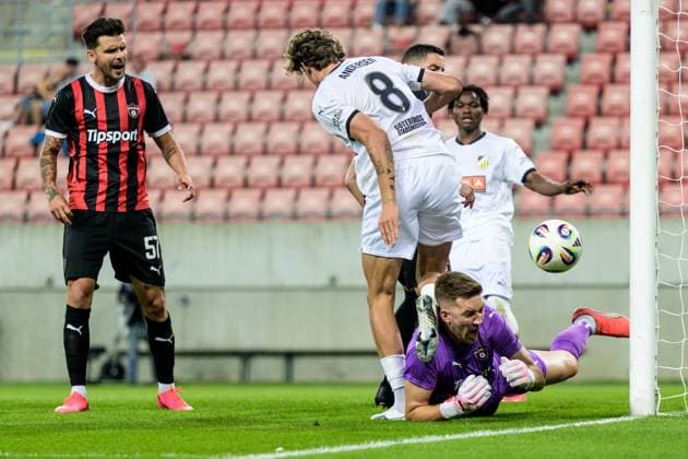 250710 Silas Andersen of Häcken and goalkeeper Ziga Frelih of Spartak Trnava during the UEFA Europa League qualifier football match between Spartak Trnava and Häcken on July 10, 2025 in Trnava. Photo: Mathilda Schuler BILDBYRAN kod MA MA0843 fotboll football soccer fotball uefa europa league europa league spartak trnava häcken bbeng Copyright: MATHILDAxSCHULER BB250710MA083