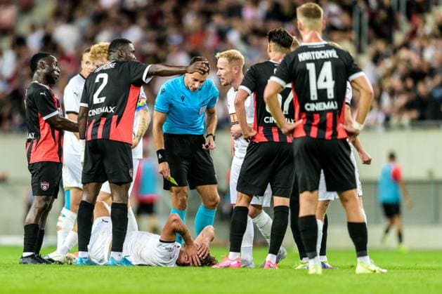 250710 Silas Andersen of Häcken and Referee Bence Csonka during the UEFA Europa League qualifier football match between Spartak Trnava and Häcken on July 10, 2025 in Trnava. Photo: Mathilda Schuler BILDBYRAN kod MA MA0843 fotboll football soccer fotball uefa europa league europa league spartak trnava häcken bbeng Copyright: MATHILDAxSCHULER BB250710MA090