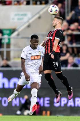 250710 John Paul Dembe of Häcken and Kristian Kostrna of Spartak Trnava during the UEFA Europa League qualifier football match between Spartak Trnava and Häcken on July 10, 2025 in Trnava. Photo: Mathilda Schuler BILDBYRAN kod MA MA0843 fotboll football soccer fotball uefa europa league europa league spartak trnava häcken bbeng Copyright: MATHILDAxSCHULER BB250710MA186