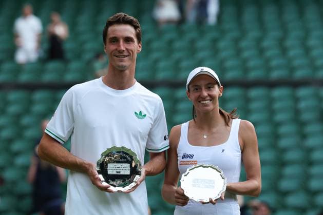 10th July 2025; All England Lawn Tennis and Croquet Club, London, England; Wimbledon Tennis Tournament, Day 11; Joe Salisbury (GBR) and Luisa Stefani (BRA) pose with the runners-up plate after losing to Sem Verbeek (NED) and Katerina Siniakova (CZE)  ActionPlus12812238 JohnxPatrickxFletcher