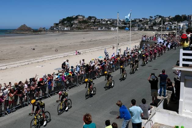 The pack of riders pictured in action during stage seven of the 2025 Tour de France cycling, from Saint-Malo to Mur-de-Bretagne (194 km), on Friday 11 July 2025 in France. The 112th edition of the Tour de France starts on Saturday 5 July in Lille, France, and will finish in Paris, France on the 27th of July. POOLxLUCAxBETTINI  x128896735x